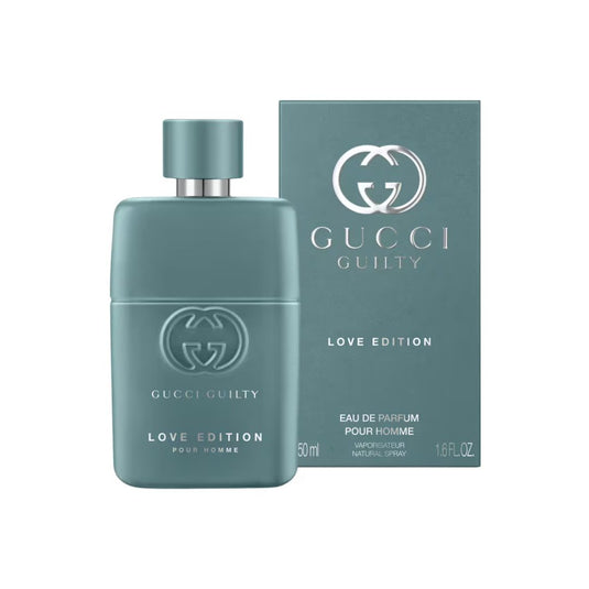 Gucci Guilty Love Edition Pour Homme Eau de Parfum 1.6 oz teal green bottle beside its matching teal retail box