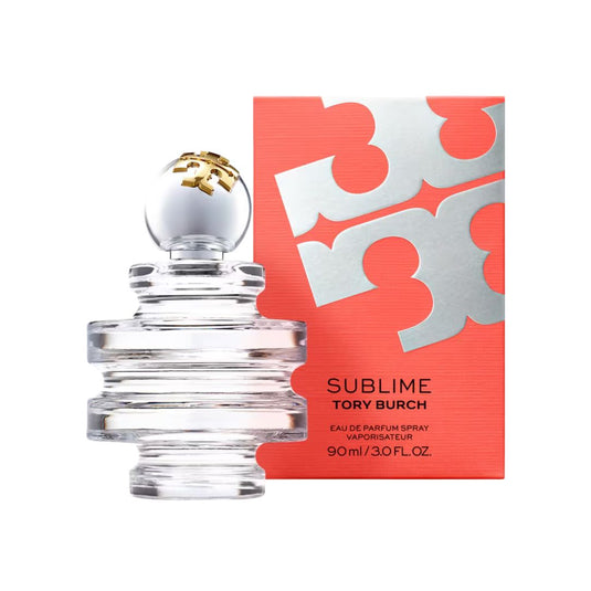 Tory Burch Sublime Eau de Parfum 3 oz clear glass bottle beside its coral and silver retail box